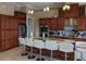 Gourmet kitchen with granite countertops and stainless steel appliances at 2761 Newman Dr, North Port, FL 34288