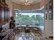 Kitchen nook with water views and access to the pool at 2761 Newman Dr, North Port, FL 34288