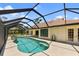 Large screened-in pool and patio area at 16681 Acapulco Rd, Punta Gorda, FL 33955