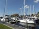Boats docked at a marina with waterfront homes in the background at 16681 Acapulco Rd, Punta Gorda, FL 33955