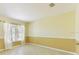 Bright bedroom with tile floors and window coverings at 16681 Acapulco Rd, Punta Gorda, FL 33955