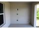 Covered patio with electrical outlets and a water spigot ready for your personal touch at 8124 Welsford Rd, Port Charlotte, FL 33981