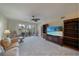 Spacious living room featuring ample natural light, comfortable seating, and built-in shelving at 4000 Bal Harbor Blvd # 214, Punta Gorda, FL 33950