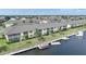 Aerial view of condo building with boat docks and canal access at 4000 Bal Harbor Blvd # 214, Punta Gorda, FL 33950