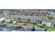 Aerial view of condo building with ample parking at 4000 Bal Harbor Blvd # 214, Punta Gorda, FL 33950
