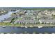 Waterfront community with multiple buildings, boat slips, and lush landscaping at 4000 Bal Harbor Blvd # 214, Punta Gorda, FL 33950