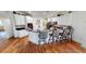 Modern kitchen with white cabinets, granite counters, and breakfast bar at 10034 Winding River Rd, Punta Gorda, FL 33950