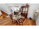 Formal dining area with dark wood table and glass top at 10034 Winding River Rd, Punta Gorda, FL 33950