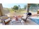 Relaxing screened patio with outdoor furniture at 10034 Winding River Rd, Punta Gorda, FL 33950
