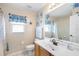 Clean bathroom with single vanity, tub shower combo, and toilet at 4530 Irdell Ter, North Port, FL 34288
