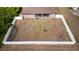 Aerial view showing house, fenced backyard, and playset at 4530 Irdell Ter, North Port, FL 34288