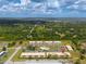 Aerial view showcasing the building's location and surrounding landscape at 26485 Rampart Blvd # D3, Punta Gorda, FL 33983