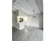 Open dining area with tile flooring and kitchen access at 75 Annapolis Ln, Rotonda West, FL 33947