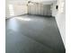 Spacious garage with freshly painted floor at 75 Annapolis Ln, Rotonda West, FL 33947
