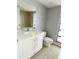 Clean bathroom with white vanity and tile flooring at 75 Annapolis Ln, Rotonda West, FL 33947