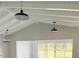 Living room with vaulted ceilings and lots of natural light at 75 Annapolis Ln, Rotonda West, FL 33947