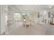 Bright dining room with glass-front display cabinets at 1060 San Mateo Dr, Punta Gorda, FL 33950