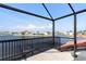 Screened balcony overlooking the canal and neighborhood at 1060 San Mateo Dr, Punta Gorda, FL 33950