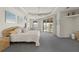 Primary bedroom with water views and large sliding doors at 1060 San Mateo Dr, Punta Gorda, FL 33950