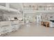 Open kitchen with breakfast bar and white cabinetry at 1060 San Mateo Dr, Punta Gorda, FL 33950