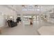 Open living area with high ceilings, fireplace and water views at 1060 San Mateo Dr, Punta Gorda, FL 33950