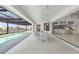 Covered patio with pool and kitchen views at 1060 San Mateo Dr, Punta Gorda, FL 33950