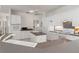 Bright white kitchen with island, double sink, and modern appliances at 1060 San Mateo Dr, Punta Gorda, FL 33950