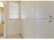 Well-lit laundry room with ample cabinetry and a window at 1060 San Mateo Dr, Punta Gorda, FL 33950