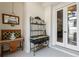 Sunroom features a decorative shelving unit and French doors at 1060 San Mateo Dr, Punta Gorda, FL 33950