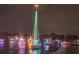 Boat parade at night with colorful lights at 1060 San Mateo Dr, Punta Gorda, FL 33950
