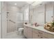 Bathroom with shower, toilet, vanity, and large mirror at 1060 San Mateo Dr, Punta Gorda, FL 33950