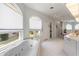 Spa-like Primary bathroom with large soaking tub and walk-in shower at 1060 San Mateo Dr, Punta Gorda, FL 33950