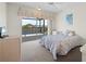 Bedroom with water views and access to balcony at 1060 San Mateo Dr, Punta Gorda, FL 33950