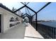 Screened balcony overlooking the canal and neighborhood at 1060 San Mateo Dr, Punta Gorda, FL 33950