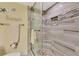 Walk-in shower with pebble floor and glass enclosure at 8750 Midnight Pass Rd # 202, Sarasota, FL 34242