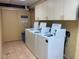 Clean and well-maintained community laundry room at 8750 Midnight Pass Rd # 202, Sarasota, FL 34242