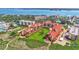 Aerial view of community, landscaping and beach at 8750 Midnight Pass Rd # 202, Sarasota, FL 34242