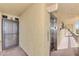 Building hallway with an elevator and unit access at 8750 Midnight Pass Rd # 202, Sarasota, FL 34242