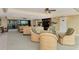Relaxing community room with comfortable seating and a TV at 8750 Midnight Pass Rd # 202, Sarasota, FL 34242