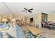 Open living room with blue sofa and coastal decor, showcasing the condo's layout at 8750 Midnight Pass Rd # 202, Sarasota, FL 34242