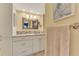 Stylish bathroom with granite vanity and mosaic tile accents at 8750 Midnight Pass Rd # 202, Sarasota, FL 34242