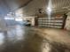 Secure parking garage with large garage door at 8750 Midnight Pass Rd # 202, Sarasota, FL 34242