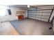 Attached garage with overhead door and extra storage at 18300 Troon Ave, Port Charlotte, FL 33948