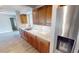 Updated kitchen with granite countertops and stainless steel appliances at 18300 Troon Ave, Port Charlotte, FL 33948