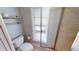 Updated bathroom with shower and window for natural light at 18300 Troon Ave, Port Charlotte, FL 33948