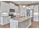 Modern kitchen with white cabinets and granite countertops at 15512 Greenwood Ave, Port Charlotte, FL 33981