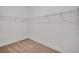 Spacious walk-in closet with wire shelving at 15512 Greenwood Ave, Port Charlotte, FL 33981