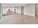 Spacious living room features wood-look tile flooring at 15512 Greenwood Ave, Port Charlotte, FL 33981