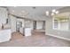 Open kitchen boasts stainless steel appliances and an island at 15512 Greenwood Ave, Port Charlotte, FL 33981