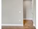 Simple hallway with neutral walls and tile flooring at 15512 Greenwood Ave, Port Charlotte, FL 33981